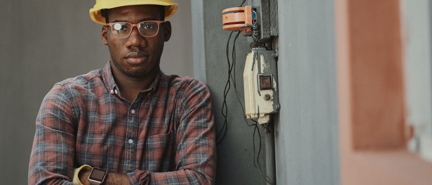 Electrician working on an electrical distribution panel